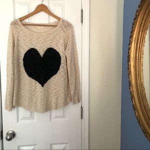 Cream sweater with black heart